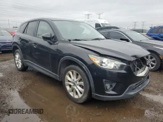 2013 Mazda CX-5 Grand Touring with VIN JM3KE4DE8D0161586, listed as a Copart auction lot 52641145 with 134,290 mi miles and Salvage Title. Bid and sale history available at carsss.com. Image 4.