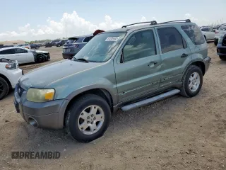 2006 Ford Escape XLT with VIN 1FMCU03186KA50966, listed as a Copart auction lot 61200405 with 198,919 mi miles and Salvage title. Bid and sale history available at DreamBid. Image 1.