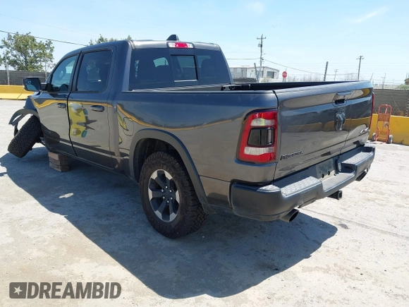 2020 Ram 1500 Rebel with VIN 1C6SRFLT8LN164196, listed as a IAAI auction lot 42538059 with 60,520 mi miles and . Bid and sale history available at DreamBid. Image 3.
