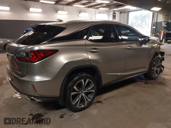 2019 Lexus RX with VIN 2T2ZZMCA0KC127053, listed as a IAAI auction lot 42113189 with 15,396 mi miles. Bid and sale history available at carsss.com. Image 4.