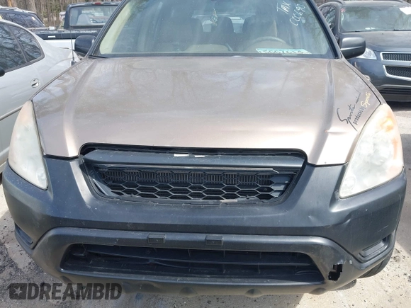 2002 Honda CR-V LX with VIN JHLRD68422C000690, listed as a IAAI auction lot 41829614 with 295,589 mi miles and . Bid and sale history available at carsss.com. Image 6.