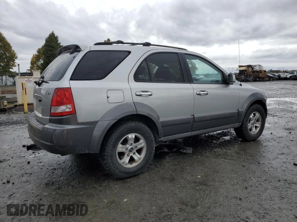 2003 Kia Sorento LX z VIN KNDJC733335030322, wystawiony jako Copart lot #77607974 z przebiegiem 109 777 mil mil oraz Szkoda całkowita • Salvage title. Historia ofert i sprzedaży dostępna na DreamBid. Obrazek 3.