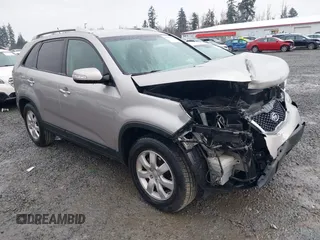 2013 Kia Sorento LX with VIN 5XYKT4A25DG379178, listed as a IAAI auction lot 41080352 with 112,927 mi miles. Bid and sale history available at carsss.com. Image 1.