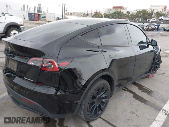 2022 Tesla Model Y Long Range z VIN 7SAYGDEE0NF508958, wystawiony jako IAAI lot #42191819 z przebiegiem 60 880 mil mil oraz . Historia ofert i sprzedaży dostępna na DreamBid. Obrazek 4.