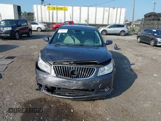 2013 Buick LaCrosse Leather с VIN 1G4GC5E35DF215359, выставлен на аукционе IAAI как лот 42561920 с пробегом 115 711 миль миль и . История ставок и продаж доступна на DreamBid. Изображение 6.