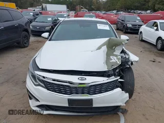 2019 Kia Optima LX with VIN 5XXGT4L30KG300576, listed as a IAAI auction lot 40753034 with 113,721 mi miles. Bid and sale history available at carsss.com. Image 12.