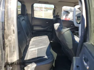 2022 Nissan Frontier S with VIN 1N6ED1EK4NN656008, listed as a Copart auction lot 57946915 with 25,607 mi miles and Salvage title. Bid and sale history available at DreamBid. Image 10.