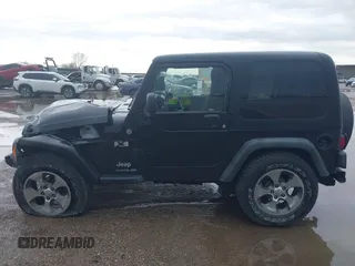 2004 Jeep Wrangler X with VIN 1J4FA39S34P753865, listed as a IAAI auction lot 41948545 with 198,169 mi miles. Bid and sale history available at carsss.com. Image 14.