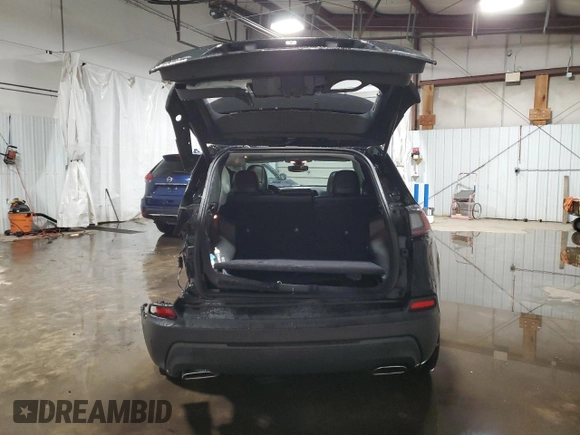 2019 Jeep Cherokee Altitude with VIN 1C4PJMLX4KD126188, listed as a Copart auction lot 41834845 with 109,405 mi miles and Salvage title. Bid and sale history available at DreamBid. Image 6.