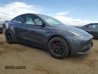 2021 Tesla Model Y Performance with VIN 5YJYGDEF0MF137692, listed as a Copart auction lot 55333395 with 56,325 mi miles and Salvage Title. Bid and sale history available at DreamBid. Image 4.