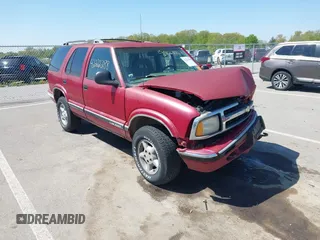1996 Chevrolet Blazer z VIN 1GNDT13W7T2254321, wystawiony jako IAAI lot #42222288 z przebiegiem Nie podano mil oraz . Historia ofert i sprzedaży dostępna na DreamBid. Obrazek 1.