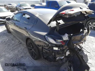 2020 BMW 8 Series M850i with VIN WBAGV8C04LBP48797, listed as a Copart auction lot 62884902 with 23,894 mi miles. Bid and sale history available at carsss.com. Image 3.