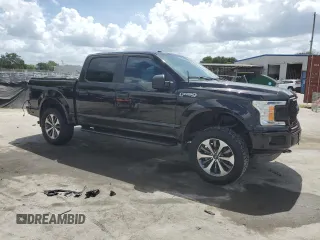2019 Ford F-150 XL with VIN 1FTEW1EP2KFC68628, listed as a Copart auction lot 51612745 with 110,807 mi miles and Salvage Title. Bid and sale history available at carsss.com. Image 4.