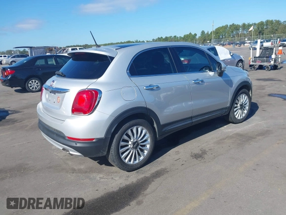 2016 FIAT 500X Lounge z VIN ZFBCFXDT2GP363767, wystawiony jako IAAI lot #37885612 z przebiegiem 74 859 mil mil oraz . Historia ofert i sprzedaży dostępna na DreamBid. Obrazek 4.