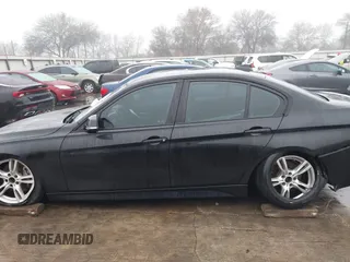 2014 BMW 3 Series 335i with VIN WBA3A9C57EF477662, listed as a IAAI auction lot 41435544 with 129,543 mi miles. Bid and sale history available at carsss.com. Image 15.