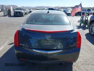 2014 Cadillac ATS Premium with VIN 1G6AE5SX4E0106197, listed as a IAAI auction lot 41720184 with 106,919 mi miles. Bid and sale history available at carsss.com. Image 16.