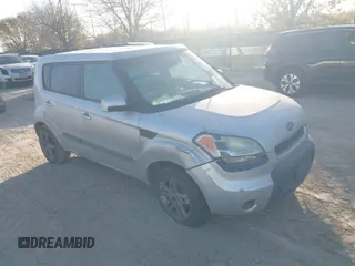 2011 Kia Soul + with VIN KNDJT2A28B7712001, listed as a IAAI auction lot 41767843 with 218,016 mi miles. Bid and sale history available at carsss.com. Image 1.