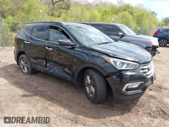 2018 Hyundai Santa Fe 2.4L z VIN 5NMZUDLB2JH058032, wystawiony jako IAAI lot #42206116 z przebiegiem 138 688 mil mil oraz . Historia ofert i sprzedaży dostępna na DreamBid. Obrazek 1.