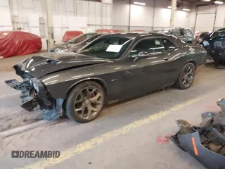 2015 Dodge Challenger R/T with VIN 2C3CDZAT5FH794310, listed as a IAAI auction lot 41725179 with 84,961 mi miles and . Bid and sale history available at DreamBid. Image 18.