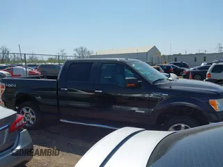 2014 Ford F-150 XL with VIN 1FTFW1ETXEFB51711, listed as a IAAI auction lot 42075381 with 238,603 mi miles. Bid and sale history available at carsss.com. Image 13.