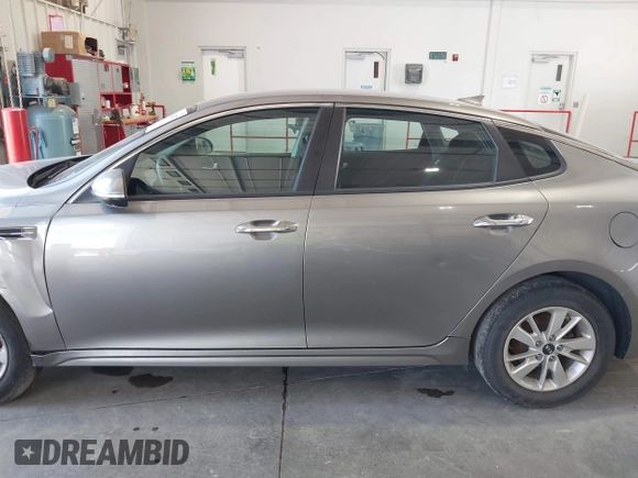 2018 Kia Optima S with VIN 5XXGT4L35JG209561, listed as a IAAI auction lot 42526577 with 161,906 mi miles and . Bid and sale history available at DreamBid. Image 14.