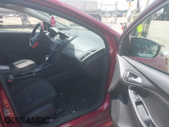 2015 Ford Focus SE z VIN 1FADP3F25FL313033, wystawiony jako IAAI lot #42206507 z przebiegiem 142 938 mil mil oraz . Historia ofert i sprzedaży dostępna na DreamBid. Obrazek 5.