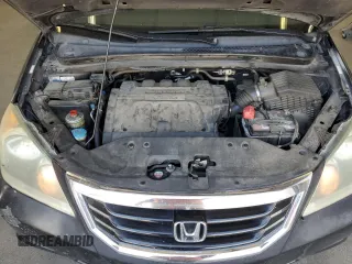 2010 Honda Odyssey Touring with VIN 5FNRL3H9XAB067890, listed as a Copart auction lot 63520575 with 213,582 mi miles and Clean title. Bid and sale history available at DreamBid. Image 12.