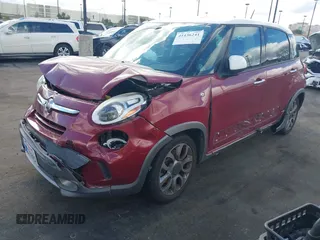 2016 FIAT 500L Trekking with VIN ZFBCFADH4GZ037918, listed as a IAAI auction lot 41436241 with 133,801 mi miles. Bid and sale history available at carsss.com. Image 2.