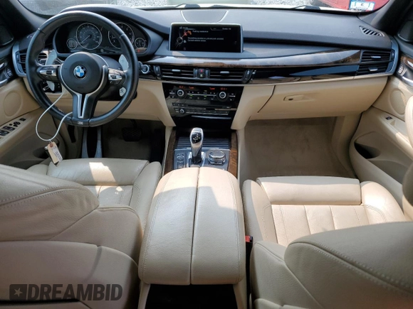 2015 BMW X5 xDrive50i z VIN 5UXKR6C5XF0J77462, wystawiony jako Copart lot #58912895 z przebiegiem 100 086 mil mil oraz Czysty tytuł • Clean title. Historia ofert i sprzedaży dostępna na DreamBid. Obrazek 8.