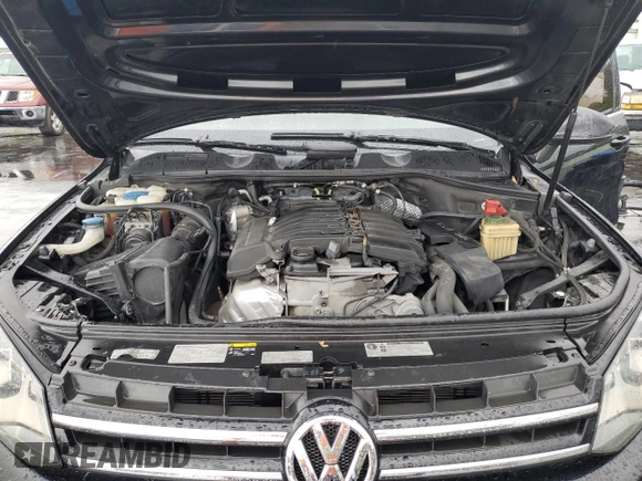 2014 Volkswagen Touareg Lux z VIN WVGEF9BP8ED011360, wystawiony jako Copart lot #51774435 z przebiegiem 101 215 mil mil oraz Szkody całkowita. Historia ofert i sprzedaży dostępna na DreamBid. Obrazek 12.