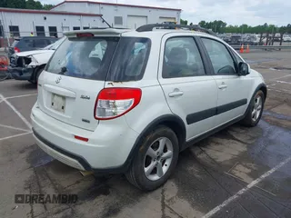 2007 Suzuki SX4 with VIN JS2YB413975105927, listed as a IAAI auction lot 42136696 with 232,480 mi miles. Bid and sale history available at carsss.com. Image 4.
