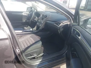 2017 Ford Fusion SE z VIN 3FA6P0H76HR259097, wystawiony jako IAAI lot #42133090 z przebiegiem 187 400 mil mil oraz . Historia ofert i sprzedaży dostępna na DreamBid. Obrazek 5.