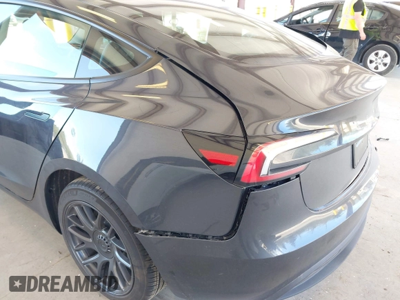 2025 Tesla Model 3 Long Range with VIN 5YJ3E1EA1SF923548, listed as a IAAI auction lot 42046257 with 3,979 mi miles and . Bid and sale history available at carsss.com. Image 6.