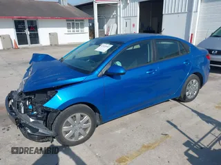 2021 Kia Rio S with VIN 3KPA24AD5ME392302, listed as a IAAI auction lot 41925903 with 14,226 mi miles and . Bid and sale history available at DreamBid. Image 2.