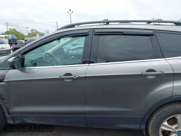 2013 Ford Escape SE with VIN 1FMCU9GX9DUA57901, listed as a IAAI auction lot 42367615 with 140,000 mi miles and . Bid and sale history available at DreamBid. Image 14.