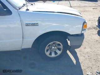 2009 Ford Ranger XL with VIN 1FTYR10DX9PA03395, listed as a IAAI auction lot 41103826 with 124,257 mi miles. Bid and sale history available at carsss.com. Image 15.