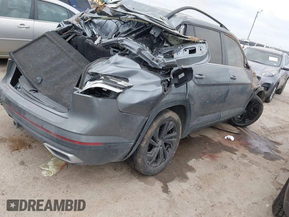 2023 Volkswagen Atlas SE with VIN 1V2JR2CA1PC521942, listed as a IAAI auction lot 41521156 with 72,216 mi miles and . Bid and sale history available at DreamBid. Image 4.
