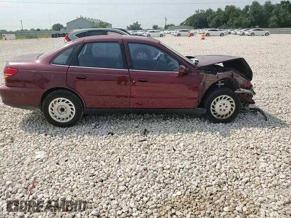 2001 Saturn LS z VIN 1G8JU52F51Y548693, wystawiony jako Copart lot #57218355 z przebiegiem Nie podano mil oraz Szkoda całkowita • Salvage title. Historia ofert i sprzedaży dostępna na DreamBid. Obrazek 13.
