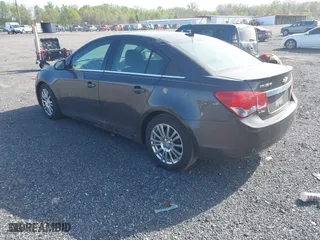 2014 Chevrolet Cruze ECO with VIN 1G1PH5SB5E7411551, listed as a IAAI auction lot 42093893 with 135,984 mi miles. Bid and sale history available at carsss.com. Image 3.