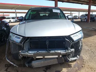 2018 Audi Q5 Premium Plus z VIN WA1BNAFY9J2055656, wystawiony jako IAAI lot #42187509 z przebiegiem 74 572 mil mil oraz . Historia ofert i sprzedaży dostępna na DreamBid. Obrazek 13.