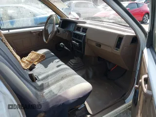 1987 Nissan Hardbody E z VIN JN6ND11S1HW047821, wystawiony jako IAAI lot #42210912 z przebiegiem 162 721 mil mil oraz . Historia ofert i sprzedaży dostępna na DreamBid. Obrazek 5.