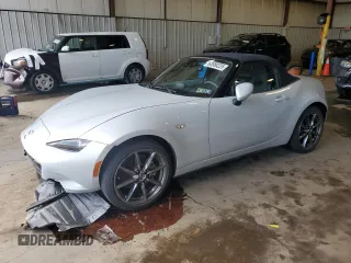 2016 Mazda MX-5 Miata Grand Touring with VIN JM1NDAD70G0118843, listed as a Copart auction lot 63988225 with 8,293 mi miles and Salvage title. Bid and sale history available at DreamBid. Image 1.