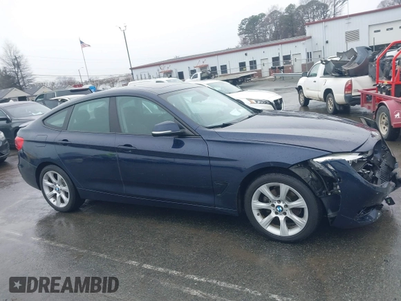 2015 BMW 3 Series 328i Gran Turismo xDrive with VIN WBA3X5C5XFD562161, listed as a IAAI auction lot 41570204 with 71,405 mi miles and . Bid and sale history available at DreamBid. Image 13.