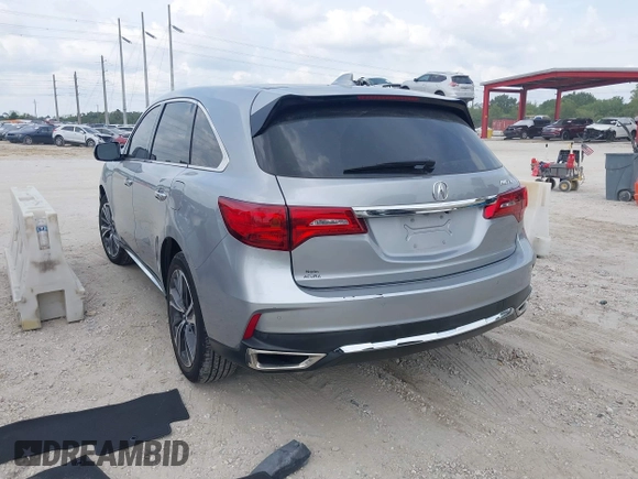 2020 Acura MDX w/Technology Pkg with VIN 5J8YD3H56LL001067, listed as a IAAI auction lot 41866822 with 54,998 mi miles. Bid and sale history available at carsss.com. Image 3.