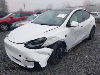 2023 Tesla Model Y Performance z VIN 7SAYGDEF2PF917295, wystawiony jako IAAI lot #41260852 z przebiegiem 23 295 mil mil oraz . Historia ofert i sprzedaży dostępna na DreamBid. Obrazek 6.