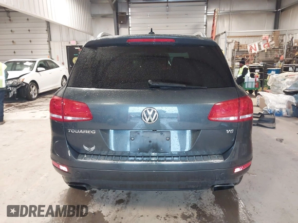 2013 Volkswagen Touareg Lux with VIN WVGEF9BP6DD007032, listed as a IAAI auction lot 41684721 with 147,249 mi miles and . Bid and sale history available at DreamBid. Image 17.