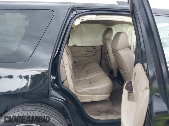 2009 Cadillac Escalade z VIN 1GYFC23249R116363, wystawiony jako IAAI lot #39887498 z przebiegiem 140 095 mil mil oraz . Historia ofert i sprzedaży dostępna na DreamBid. Obrazek 8.