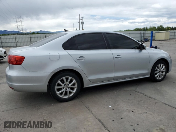 2014 Volkswagen Jetta SE with VIN 3VWD17AJ0EM314456, listed as a Copart auction lot 57380645 with 148,801 mi miles and Salvage title. Bid and sale history available at DreamBid. Image 3.
