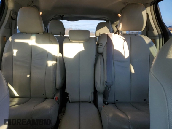 2011 Toyota Sienna XLE AAS with VIN 5TDYK3DC1BS170855, listed as a Copart auction lot 86829904 with 142,117 mi miles and Salvage Title. Bid and sale history available at carsss.com. Image 10.