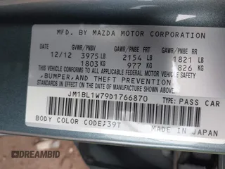 2013 Mazda 3 i Grand Touring with VIN JM1BL1W79D1766870, listed as a IAAI auction lot 41691063 with 107,851 mi miles. Bid and sale history available at carsss.com. Image 9.